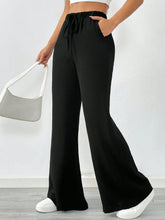 HIGH-WAISTED FLARED TROUSER