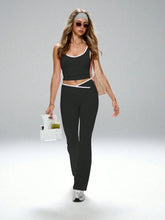 SPORTS BRA WITH CRISS-CROSS FRONT FLARE LEGGING