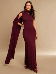 ROUND NECK SLEEVELESS DRESS FEATURES A FLOWING NECKLINE WITH A DETACHABLE TIE
