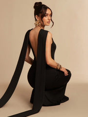 ASYMMETRICAL FITTED MINI DRESS, WITH ITS FLARED SLEEVES AND FRONT TIE