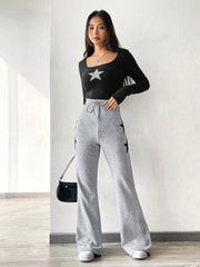 HIGH WAISTED TIE FLARED PANTS WITH STAR PATCHWORK