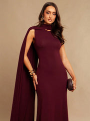 ROUND NECK SLEEVELESS DRESS FEATURES A FLOWING NECKLINE WITH A DETACHABLE TIE