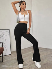 SOLID RIBBED FLARED-LEG PANT